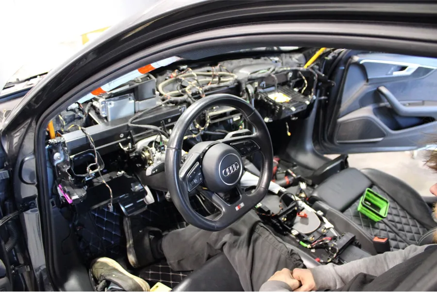 Audi dashboard opened up for electrical work at Blitz German Auto, where we do Audi diagnostics in Kennesaw