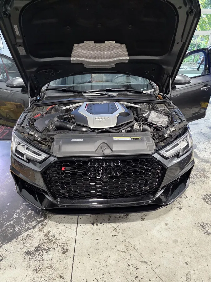 Audi RS5 engine bay during German auto repair at Blitz German Auto in Kennesaw